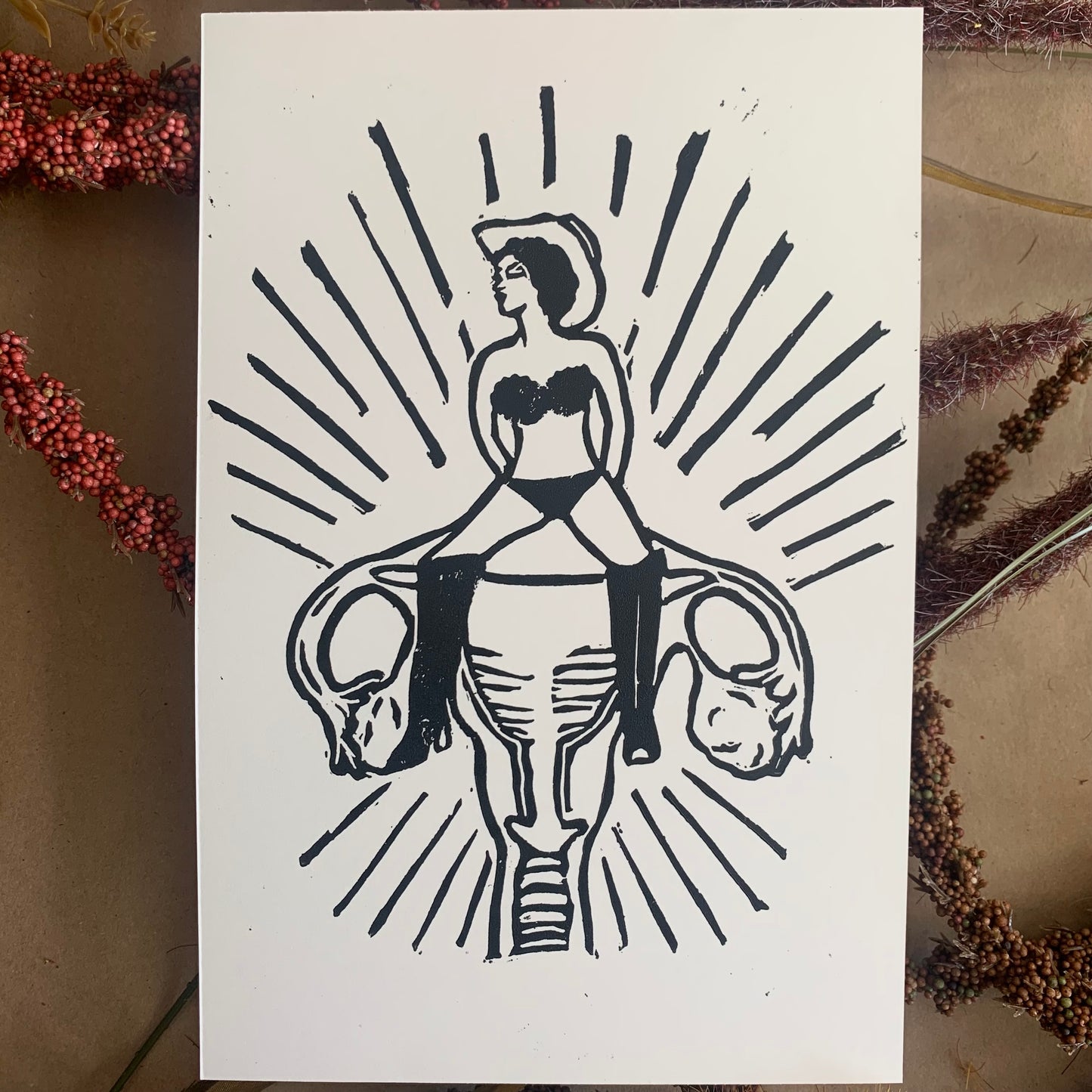 "my uterus, not yours" black lino print