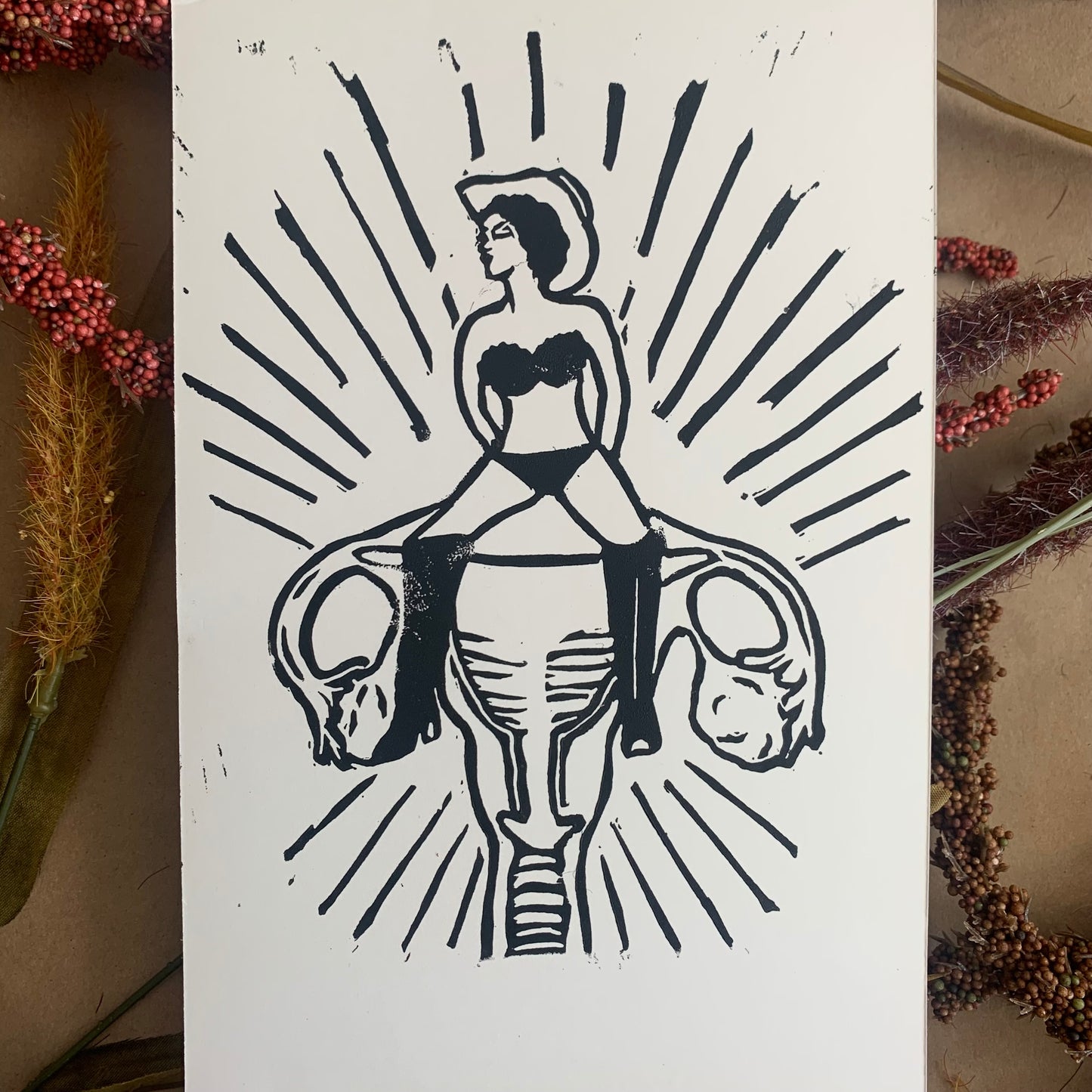 "my uterus, not yours" black lino print