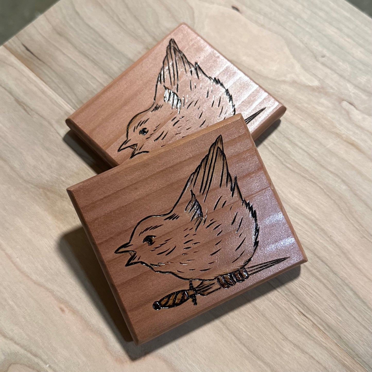 birb with knife redwood coasters